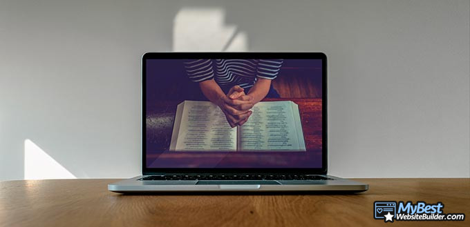 Church websites: a person praying in the computer screen. Church websites: a person praying in the computer screen.